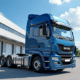 Camion utilitaire brillant devant un entrepôt moderne en plein jour
